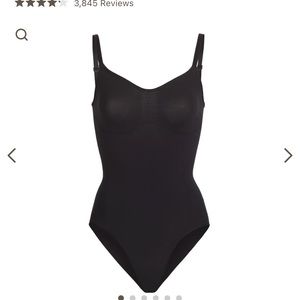 SKIMS sculpting bodysuit without snaps, never worn before! Size S/M